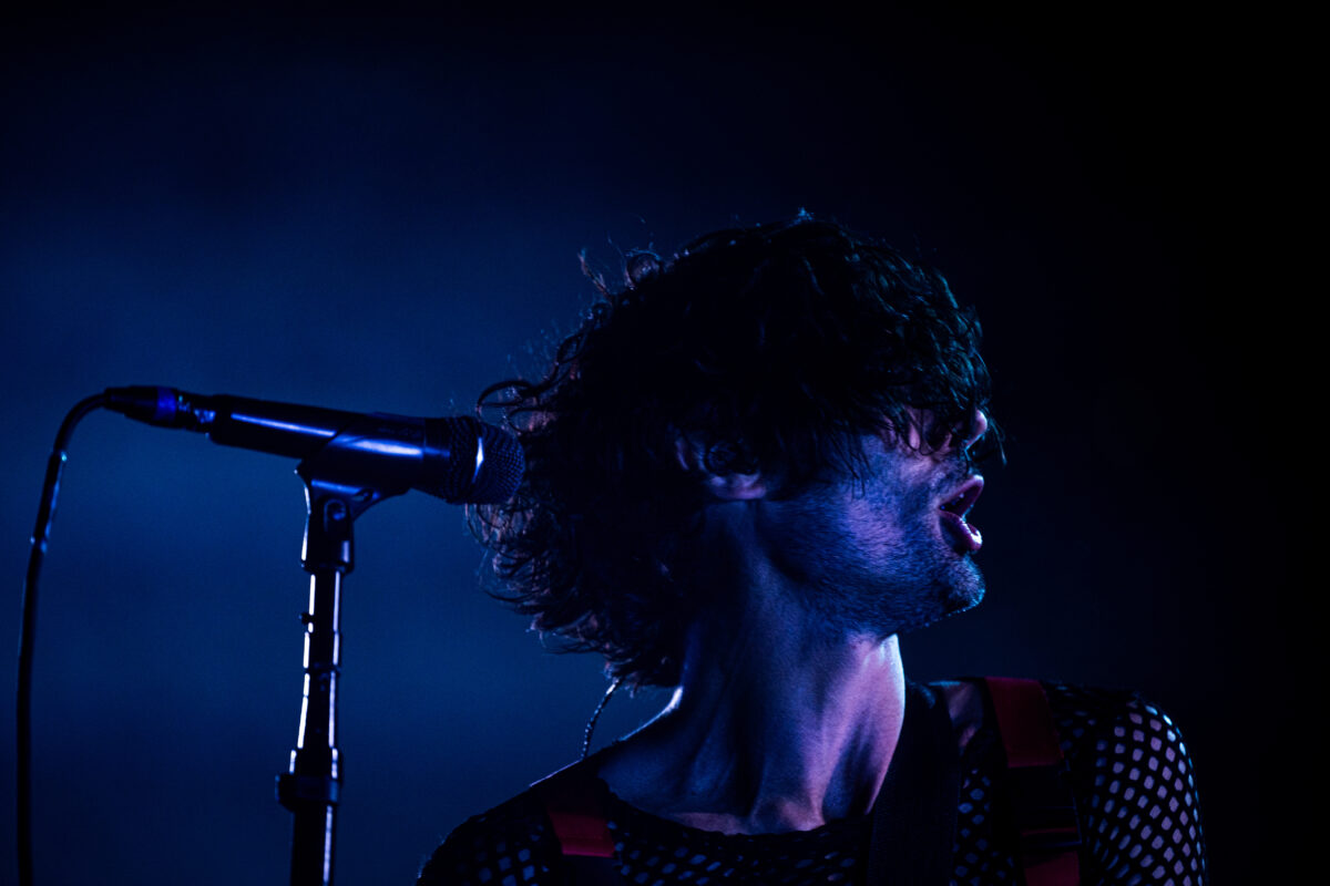 The All-American Rejects live in concert in San Diego California, Petco Park. Tyson Ritter singing and performing on stage. Professional live music photography by Evan Denworth.