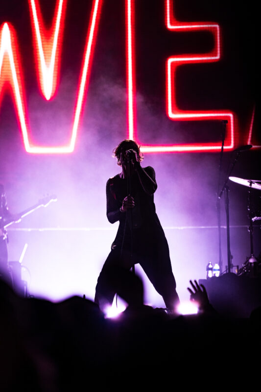 The All-American Rejects live in concert in San Diego California, Petco Park. Tyson Ritter singing and performing on stage. Professional live music photography by Evan Denworth.