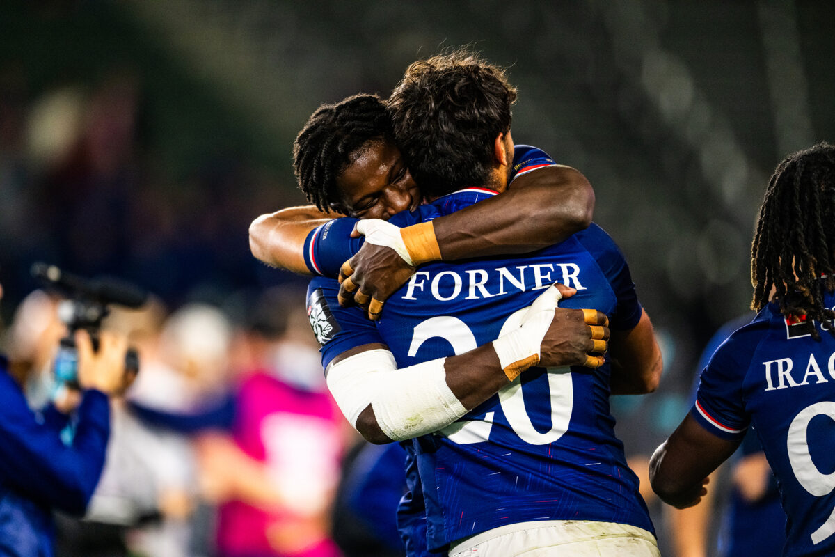 2024 HSBC SVN'S Rugby Tournament in Los Angeles at Dignity Health Sports Park. France Rugby professional rugby player sports action photography. High-impact commercial sports imaging for team branding. France Rugby players holding each other in embrace after winning tournament. Emotional photography