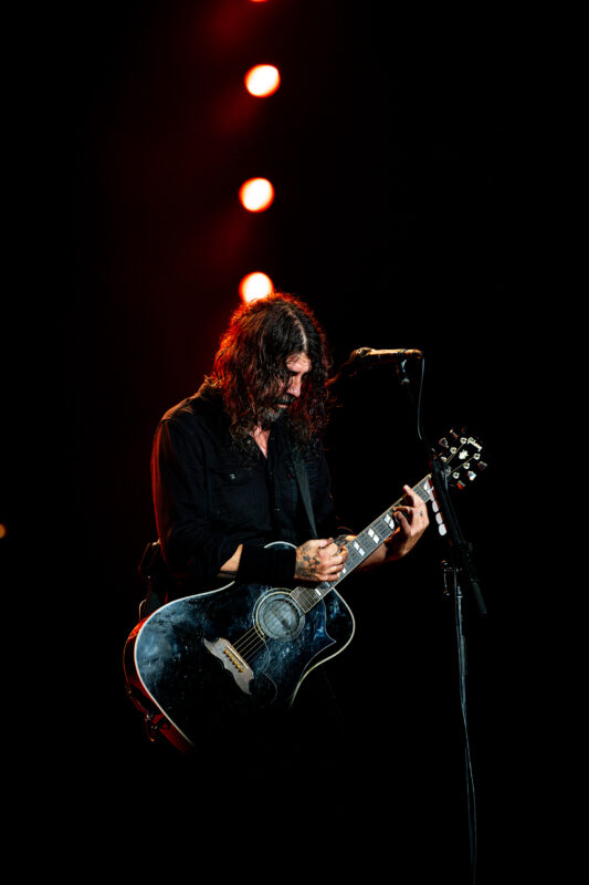 Foo Fighters live in concert in San Diego California, Petco Park. Dave Grohl singing and performing on stage. Professional live music photography by Evan Denworth.
