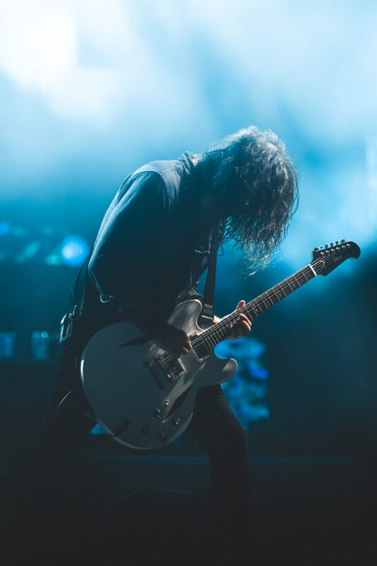 Foo Fighters live in concert in San Diego California, Petco Park. Dave Grohl singing and performing on stage. Professional live music photography by Evan Denworth.